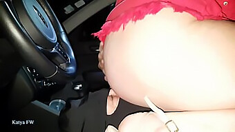 Latex-Clad Mistress Katya Uses Her Slave As A Car Seat Cushion While Driving In A Red Mini Skirt