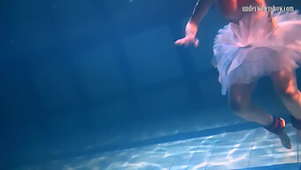 Bikini-Clad Bulava Lozhkova In A Red Skirt And Tie Underwater