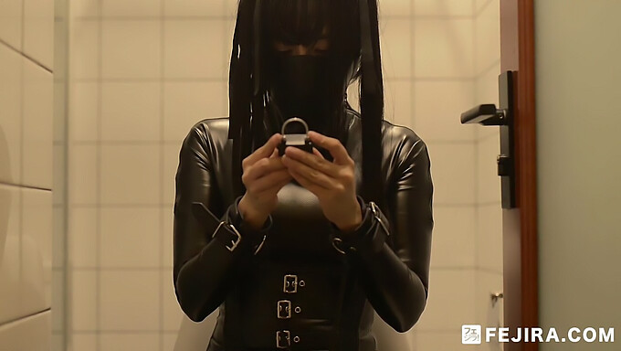 Japanese girl indulges in BDSM and solo play with leather bondage