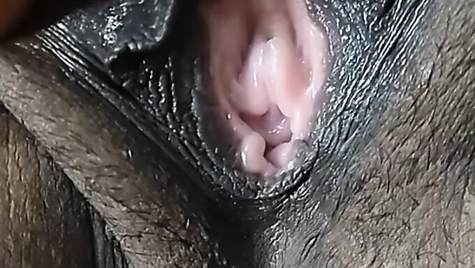 Intimate view of my wife's dark-haired pussy and big nipples