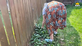 A Mature Married Woman Becomes Trapped In A Fence, Leading To A Steamy Encounter With A Helpful Neighbor