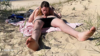 A Teenage Nudist Couple Indulges In Oral Pleasure At The Beach